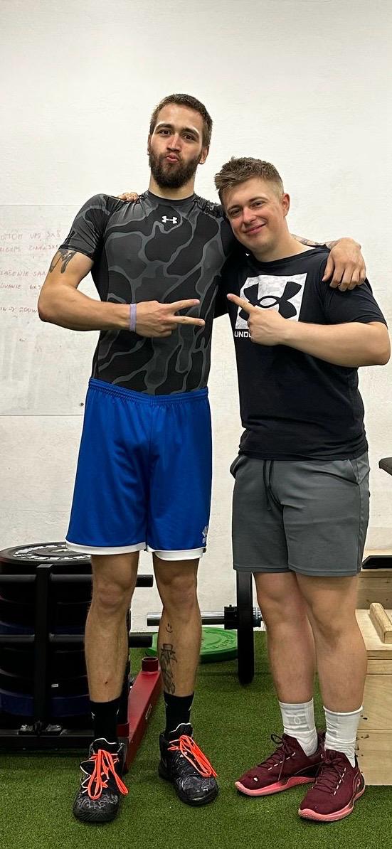Športovec s trénerom